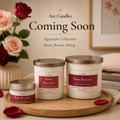 Three Arc Candles scented soy candles in white jars with rose-colored labels and metallic lids, displayed on a wooden tray with rose petals and flowers in the background. Large text reads 'Coming Soon' with 'Signature Collection' and the scent name 'Bloom.