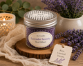 A jar air freshener labeled 'Lavender Serenity' by Arc Candles, styled on a wooden slice with a cream lace cloth, a lit candle, and lavender sprigs in a ceramic pot.